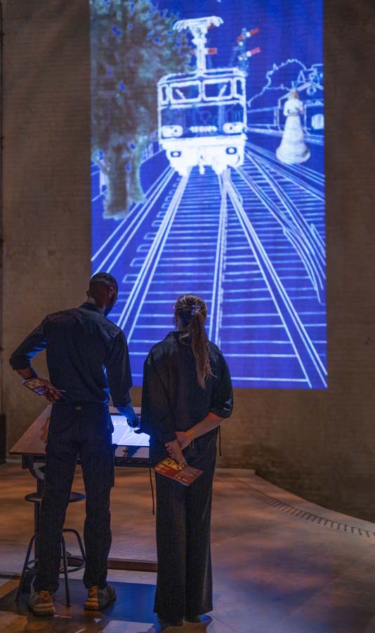 Projected train drawing installation